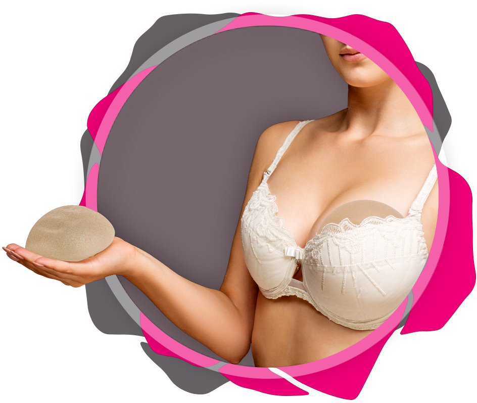 woman holding breast implants prosthesis